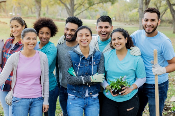 People doing public service by planting flowers