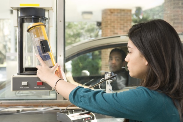 lady in front of vacuum shoot